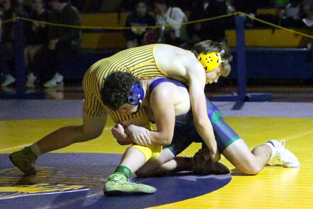 RYAN SPARKS | THE DAILY WORLD Aberdeens Michael Hatton (top) grapples with Willapa Harbors Lucas Swogger during the 165-pound final match at the Grays Harbor Championships on Saturday at Aberdeen High School.