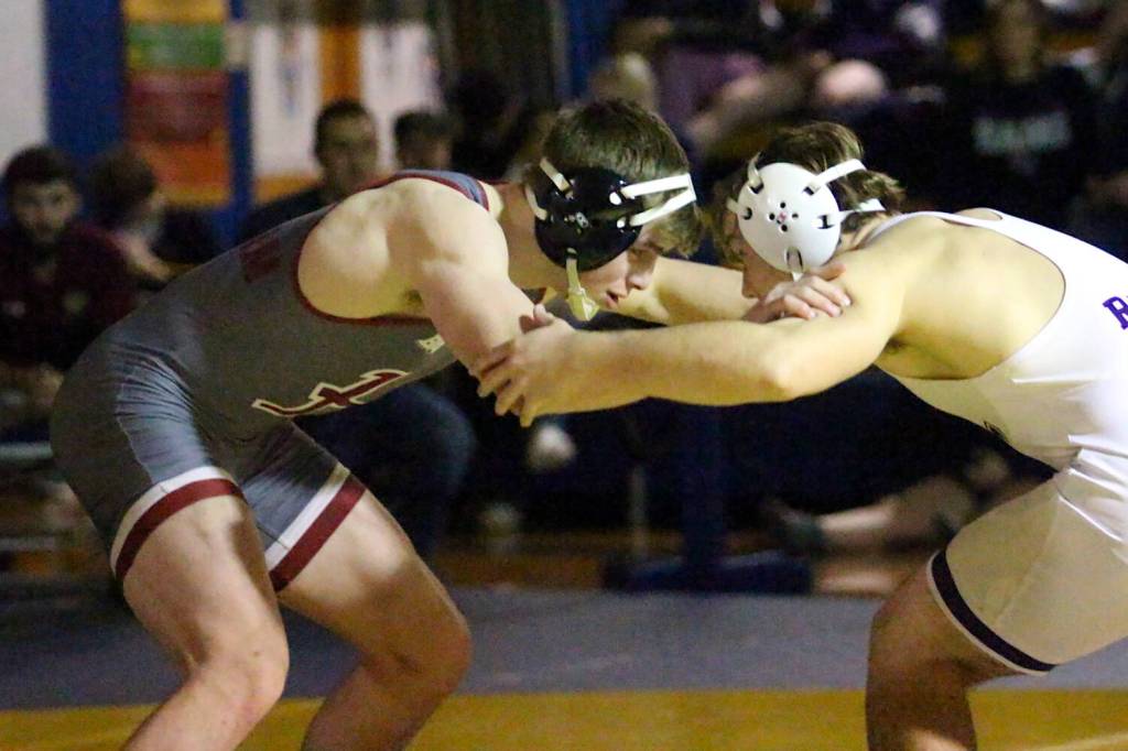 RYAN SPARKS | THE DAILY WORLD Hoquiams Oliver Bryson (left) defeated North Thurstons Charles Miller via 20-3 technical fall in the 190-pound final at the Grays Harbor Championships on Saturday at Aberdeen High School.