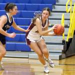 PHOTO BY HAILEY BLANCAS Montesanos Makena Blancas (right) surveys the floor during a 53-37 loss to Olympia on Friday in Adna.