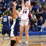 PHOTO BY HAILEY BLANCAS Montesano forward Jillie Dalan (24) shoots during a 53-37 loss to Olympia on Friday in Adna.