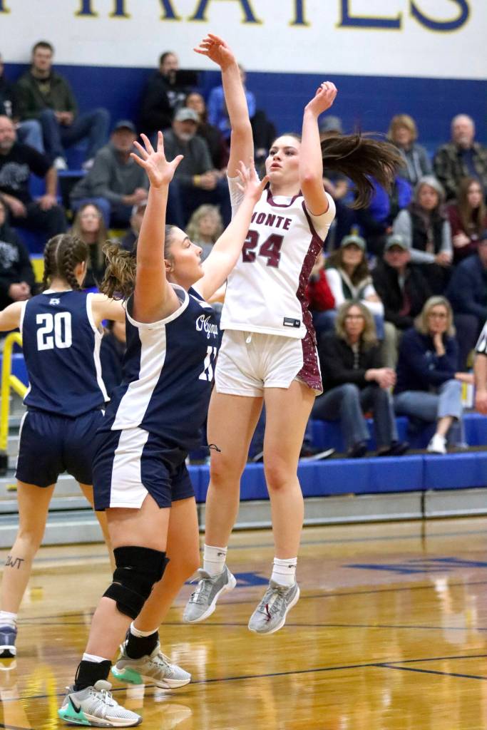 PHOTO BY HAILEY BLANCAS Montesano forward Jillie Dalan (24) shoots during a 53-37 loss to Olympia on Friday in Adna.