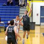 PHOTO BY HAILEY BLANCAS Montesanos Caden Grub (23) drives to the hoop during a 65-55 win over Wahkiakum on Saturday at Adna High School.