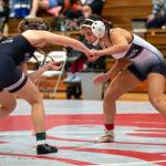 PHOTO BY FOREST WORGUM Hoquiams Shye Hinchen (left) and Montesanos Angelina Brunzie wrestle in a 130-pound quarterfinal match at the Grizzly Stocking Stuffer wrestling tournament on Saturday at Hoquiam High School.