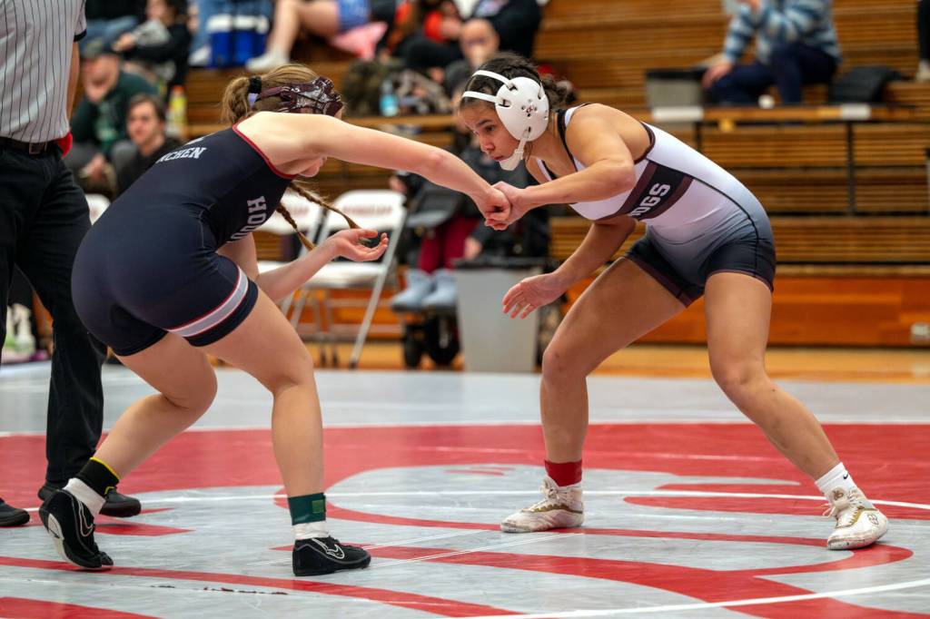 PHOTO BY FOREST WORGUM Hoquiams Shye Hinchen (left) and Montesanos Angelina Brunzie wrestle in a 130-pound quarterfinal match at the Grizzly Stocking Stuffer wrestling tournament on Saturday at Hoquiam High School.