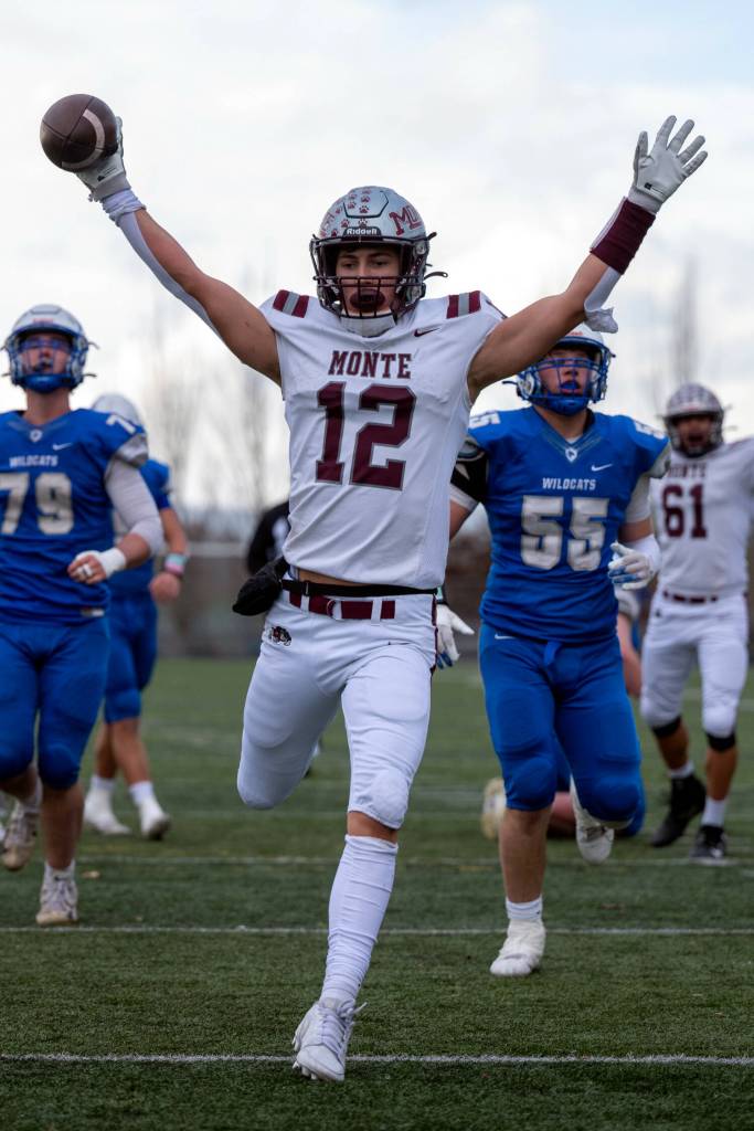 PHOTO BY FOREST WORGUM Montesano junior Toren Crites (12) scores a touchdown during a 1A State quarterfinal victory over La Center on Nov. 23.