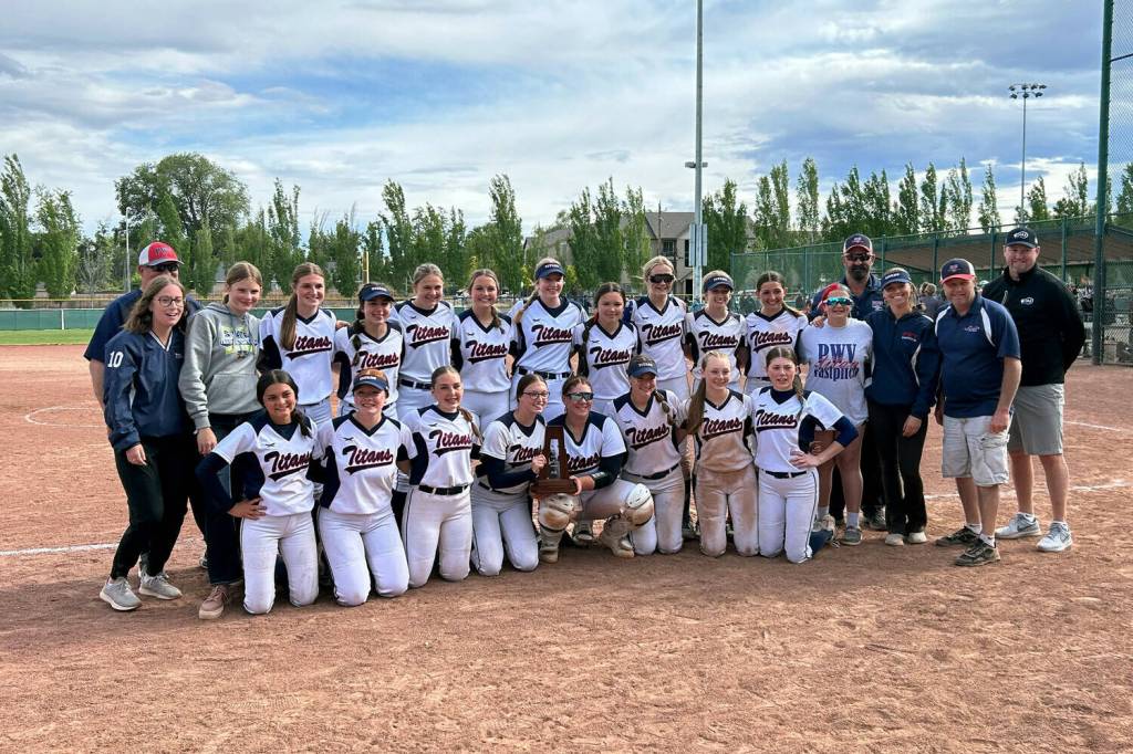 KODY CHRISTEN | THE CHRONICLE 
The Pe Ell-Willapa Valley Titans pose with the 2B State third-place trophy after defeating Kittitas 6-4 in Yakima on May 25.