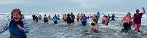 Barbara A. Smith photos / For The Daily World
There was a lot of screaming as the Polar Plungers entered the Pacific Ocean in Ocean Shores on Wednesday.