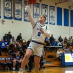 PHOTO BY FOREST WORGUM Elma senior Traden Carter scores two of his game-high 14 points in a 62-29 win over Rochester on Friday in Elma.