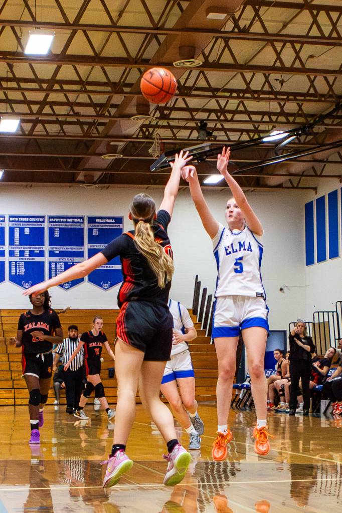 PHOTO BY MIKE ROBERTS Elmas Mikayla Roberts (5) attempts a jump shot during a 56-43 loss to Kalama on Saturday at Elma High School.