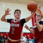 PHOTO BY FOREST WORGUM Hoquiams Ethan Byron (2) grabs a loose ball during the Grizzlies 57-41 loss to Tenino on Friday at Tenino High School.