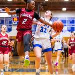 PHOTO BY MIKE ROBERTS Hoquiams RenaeJah Burtenshaw (2) defends Elmas Olivia Moore during the Grizzlies 49-27 win on Tuesday in Elma.