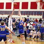 PHOTO BY LARRY BALE Willapa Valleys Nathan Fluke (left) puts up a shot over Columbia Adventists Logan Pierce (3) in the Vikings 56-52 win on Thursday in Menlo.