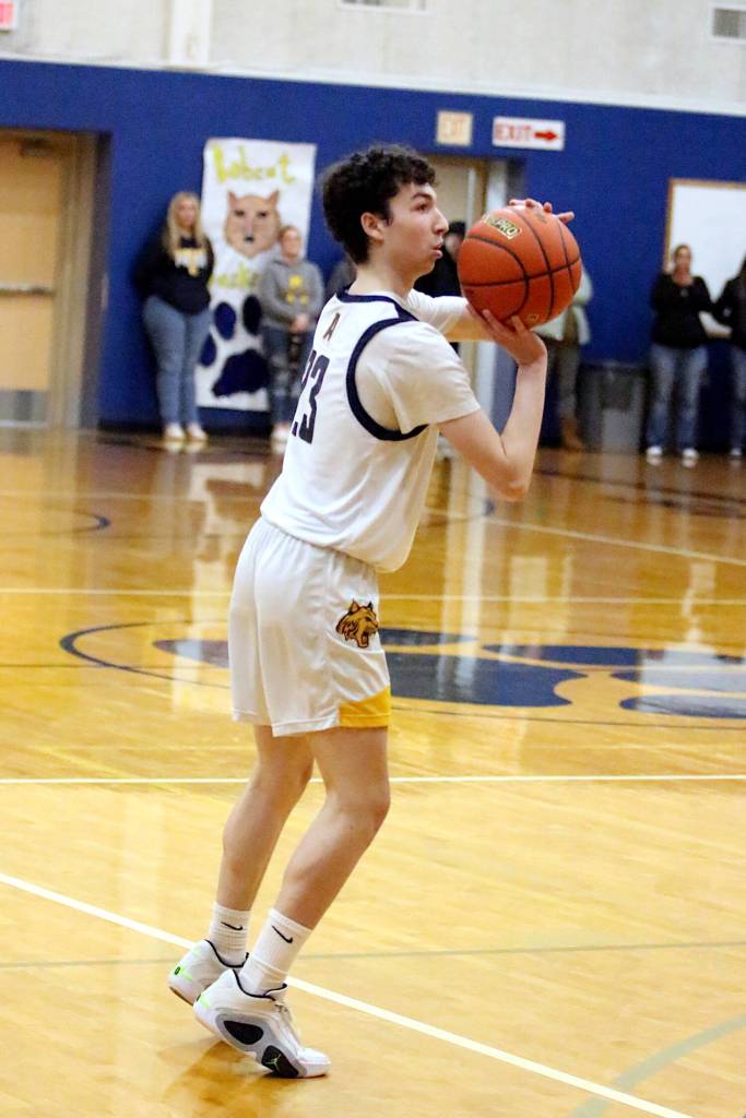 RYAN SPARKS | THE DAILY WORLD Aberdeen guard Jhacob Quezada puts up a 3-pointer during a 66-61 victory over Hoquiam on Monday at Sam Benn Gym in Aberdeen.