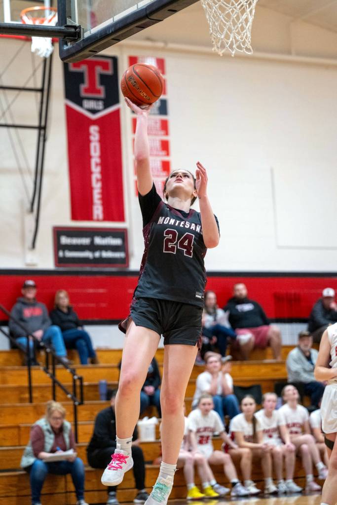 PHOTO BY FOREST WORGUM Montesano forward Jillie Dalan scores two of her 18 points in a 61-15 victory over Tenino on Monday in Tenino.