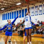 PHOTO BY MIKE ROBERTS Elma sophomore Keke Bol (10) scores on a layup while Rochesters Lexi Dupont defends during the Eagles 44-32 victory on Wednesday in Elma.