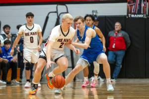 PHOTO BY FOREST WORGUM Elmas Isaac McGaffey (right) defends Teninos Austin Gonia during the Eagles 60-45 loss on Thursday in Tenino.