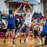 PHOTO BY FOREST WORGUM Montesanos Nathan Dowler (32) shoots during the Bulldogs 58-52 victory on Tuesday at Montesano High School.