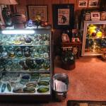 Alan Rammer’s collection of glass floats includes rare and valuable finds from his years of beachcombing around the world. He has cases full of them in his home. (Dean Rutz / The Seattle Times)