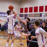 PHOTO BY LARRY BALE Willapa Valleys Blane King (left) shoots against Ocostas Noah Prigmore (5) during the Vikings 58-41 win on Friday at Willapa Valley High School.