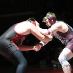 RYAN SPARKS | THE DAILY WORLD Montesanos Lucas Roberts (right) wrestles against Teninos Rowdie Tafoya during the 285-pound championship at the 1A District 4 EvCo tournament on Saturday at Hoquiam High School.