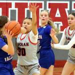 RYAN SPARKS | THE DAILY WORLD Taholahs Keeliana McCrory (30) and Maliah Pluff (right) defend against Willapa Valleys Lauren Matlock (left) and Kylee Fluke during the Chitwhins 53-48 victory on Tuesday at Hoquiam High School.