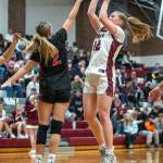 PHOTO BY FOREST WORGUM 
Montesano guard Tieander Olson (right) puts up a jump shot against Kalamas Bridgette Hollifield during the Bulldogs 74-40 win in the 1A District 4 Tournament on Wednesday in Montesano.