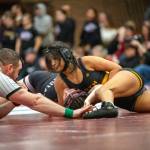 PHOTO BY FOREST WORGUM North Beachs Mayra Strandberg (right) controls Hoquiams Emily Brodhead during the 115-pound title match at the 1B/2B/1A District 4 Championships on Saturday at Montesano High School.