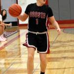 DAILY WORLD FILE PHOTO Ocosta guard Dalton Welch (1) scored 14 points in the Wildcats 53-42 victory over Columbia Adventist Academy in a 1B District 4 semifinal game on Monday at Adna High School.