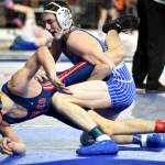 PHOTO BY SUE MICHALAK BUDSBERG Elmas Blaize Salazar (right) works to control Life Christians Atticus Berry in a 144-pound match during the Mat Classic XXXVI on Friday at the Tacoma Dome.