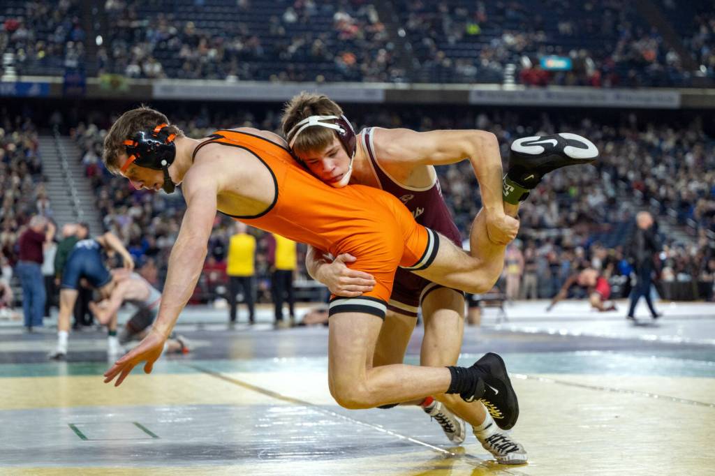 PHOTO BY FOREST WORGUM Montesanos Kole Kjesbu (right) controls Kalamas Brayden Storedahl during a 144-pound match at the Mat Classic XXXVI on Friday at the Tacoma Dome.