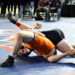 PHOTO BY SUE MICHALAK BUDSBERG Hoquiams Oliver Bryson (top) works to pin Kalamas Zach Foreman during the 1A 190-pound championship match at the Mat Classic XXXVI on Saturday in Tacoma.