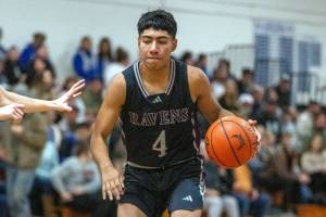 PHOTO BY FOREST WORGUM Raymond-South Bend senior guard Chris Quintana, seen here in a file photo, was named the 2B Pacific League Most Valuable Player after averaging 20.5 point per game this season.