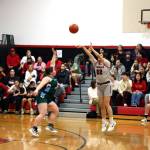 PHOTO BY TIA CHENEY Taholahs Noelani McCrory (22) shoots a 3-pointer during a 58-35 win over Evergreen Lutheran in the opening round of the 1B State Tournament on Tuesday at Taholah High School.