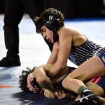 PHOTO BY SUE MICHALAK BUDSBERG Elma junior Xavier Espinoza (top) controls Life Christian Academys Elijah Miller during the 1A State 113-pound championship match on Saturday at the Tacoma Dome.