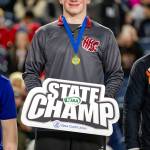 JIM THRALL | MATFOCUS.COM Hoquiams Oliver Bryson stands atop the podium after winning the 1A class 190-pound state championship at the Mat Classic XXXVI on Saturday in Tacoma.