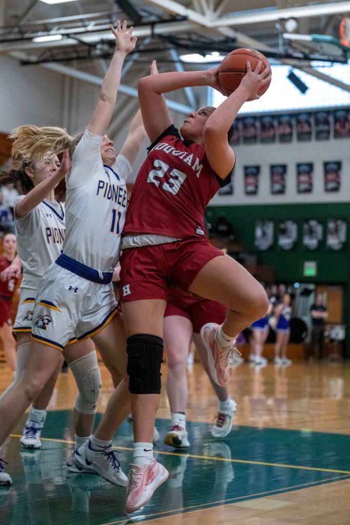PHOTO BY FOREST WORGUM Hoquiams Aaliyah Kennedy shoots against Nooksack Valleys Kate Shintaffer during the Grizzlies 64-42 loss in a 1A State Tournament game on Saturday at Mount Vernon High School.