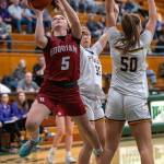 PHOTO BY FOREST WORGUM Hoquiams Lexi LaBounty (5) drives to the hoop during a 64-42 loss to Nooksack Valley in a 1A State Tournament game on Saturday at Mount Vernon High School.