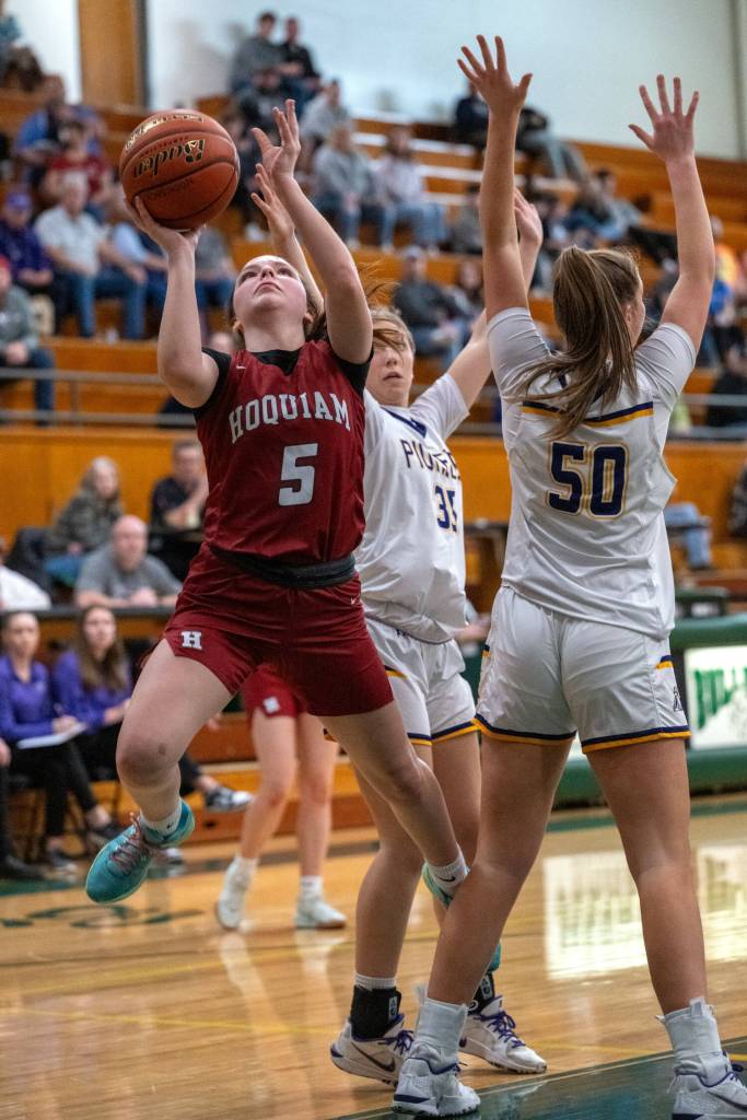 PHOTO BY FOREST WORGUM Hoquiams Lexi LaBounty (5) drives to the hoop during a 64-42 loss to Nooksack Valley in a 1A State Tournament game on Saturday at Mount Vernon High School.