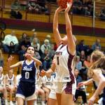 RYAN SPARKS | THE DAILY WORLD Montesanos Josie Forster (1) scores during the Bulldogs 47-19 victory in a 1A State Tournament game on Saturday at W.F. West High School.
