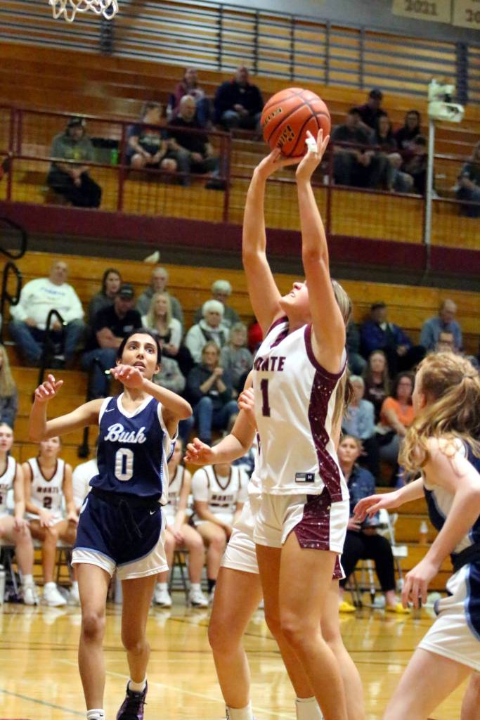 RYAN SPARKS | THE DAILY WORLD Montesanos Josie Forster (1) scores during the Bulldogs 47-19 victory in a 1A State Tournament game on Saturday at W.F. West High School.