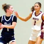RYAN SPARKS | THE DAILY WORLD Montesanos Jordyn Perry (right) defends The Bush Schools Elise Fischer during the Bulldogs 47-19 victory in a 1A State Tournament game on Saturday at W.F. West High School.