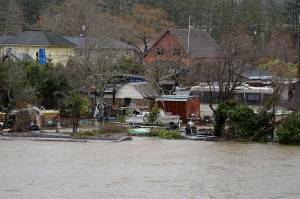 The Daily World file photo
Looking west from the bridge near Kurt Cobain Park, several homes appeared to have serious flooding from the Wishkah River at high tide in a round of flooding in 2018.