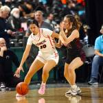 PHOTO BY HAILEY BLANCAS Montesanos Makena Blancas (right) defends Cashmeres Allie McKenna during a 35-28 loss in a 1A State Tournament Round of 12 game on Wednesday at the Yakima SunDome.