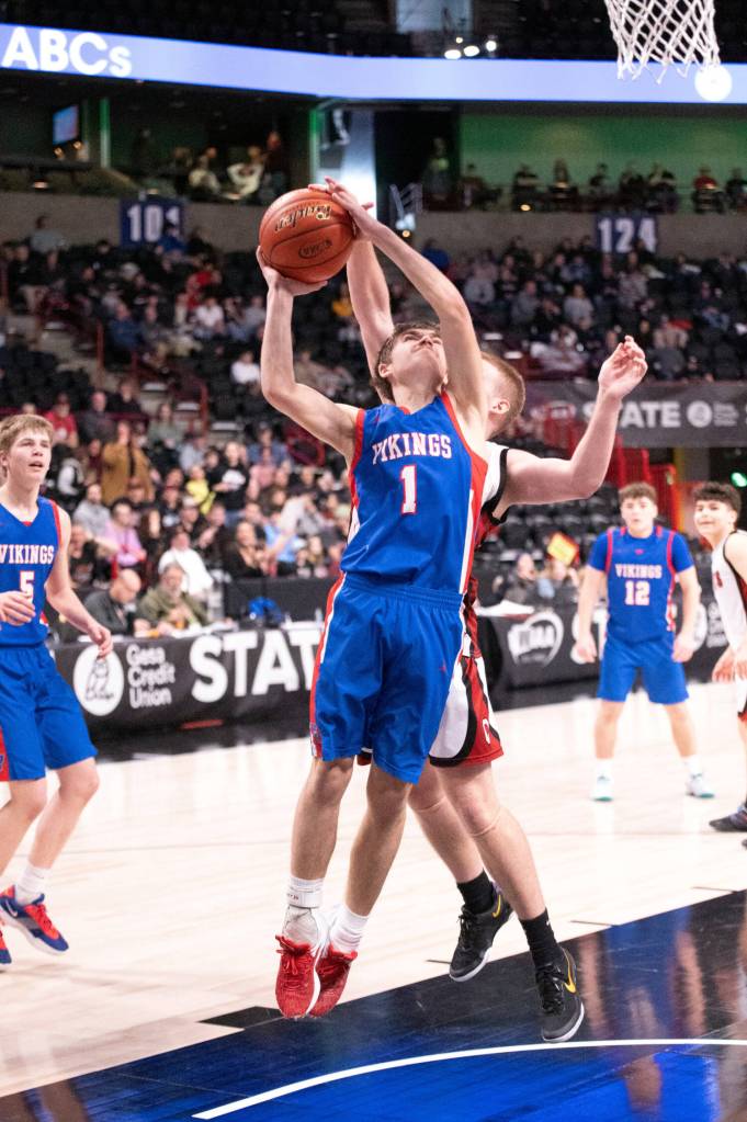 PHOTO BY TIA CHANNELL Willapa Valleys Brody Ritzman drives to the basket during the Vikings 51-46 win over Ocosta in a 1B State Tournament elimination game on Friday at the Spokane Arena.