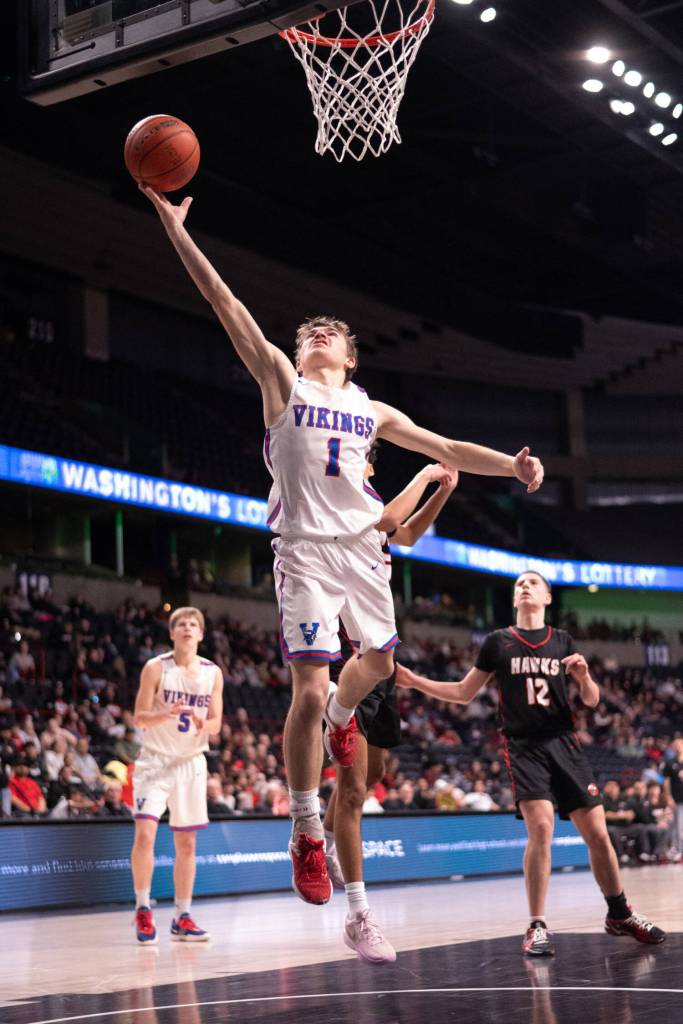 PHOTO BY TIA CHANNELL Willapa Valleys Brody Ritzman (1) glides to the hoop during a 64-46 loss to Tulalip Heritage in the 1B State Tournament fourth/sixth-place game on Saturday at the Spokane Arena.