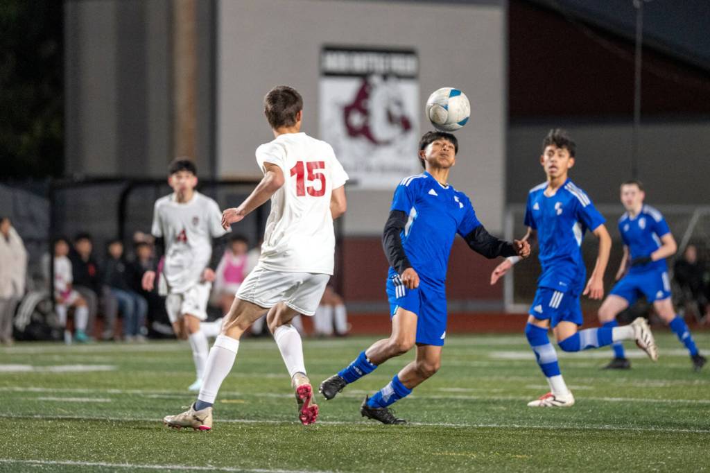 PHOTO BY FOREST WORGUM The Elma Eagles (blue) scrimmage with the Hoquiam Grizzlies during the Montesano Boys Soccer Jamboree on Monday at Montesano High School.