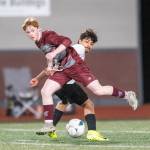 PHOTO BY FOREST WORGUM The Montesano Bulldogs (red) scrimmage with the Raymond-South Bend Ravens during the Montesano Boys Soccer Jamboree on Monday at Montesano High School.
