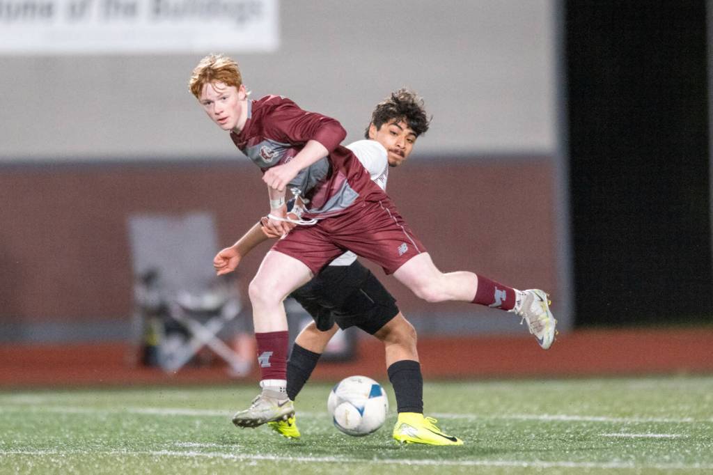PHOTO BY FOREST WORGUM The Montesano Bulldogs (red) scrimmage with the Raymond-South Bend Ravens during the Montesano Boys Soccer Jamboree on Monday at Montesano High School.