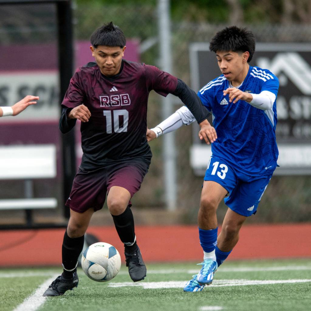PHOTO BY FOREST WORGUM The Elma Eagles (blue) scrimmage with the Raymond-South Bend Ravens during the Montesano Boys Soccer Jamboree on Monday at Montesano High School.