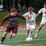 RYAN SPARKS | THE DAILY WORLD Montesanos Felix Romero (left) dribbles the ball during a scrimmage against the Hoquiam Grizzlies during the Montesano Boys Soccer Jamboree on Monday at Montesano High School.